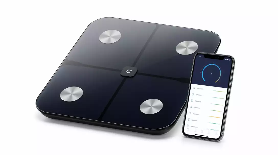 Modern Etekcity smart fitness scale on a white background with a smartphone showing health app data
